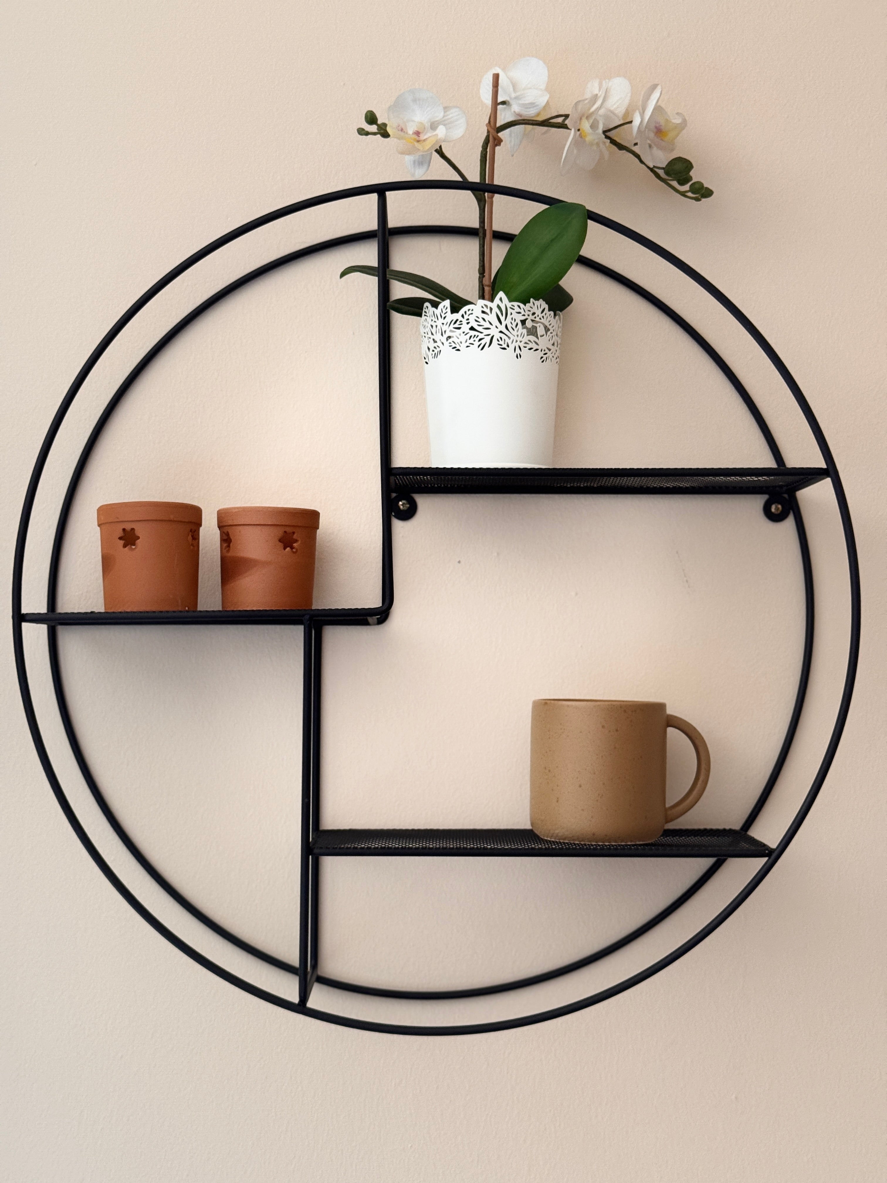 Schwarzes rundes Metallregal – Modernes und minimalistisches Design